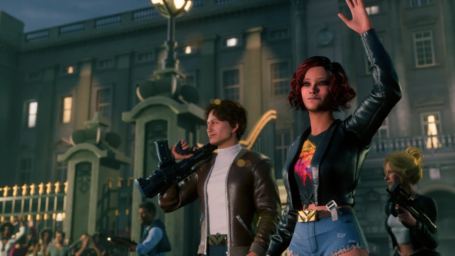 An MVX squad waves to a cheering crowd outside the Palace at night